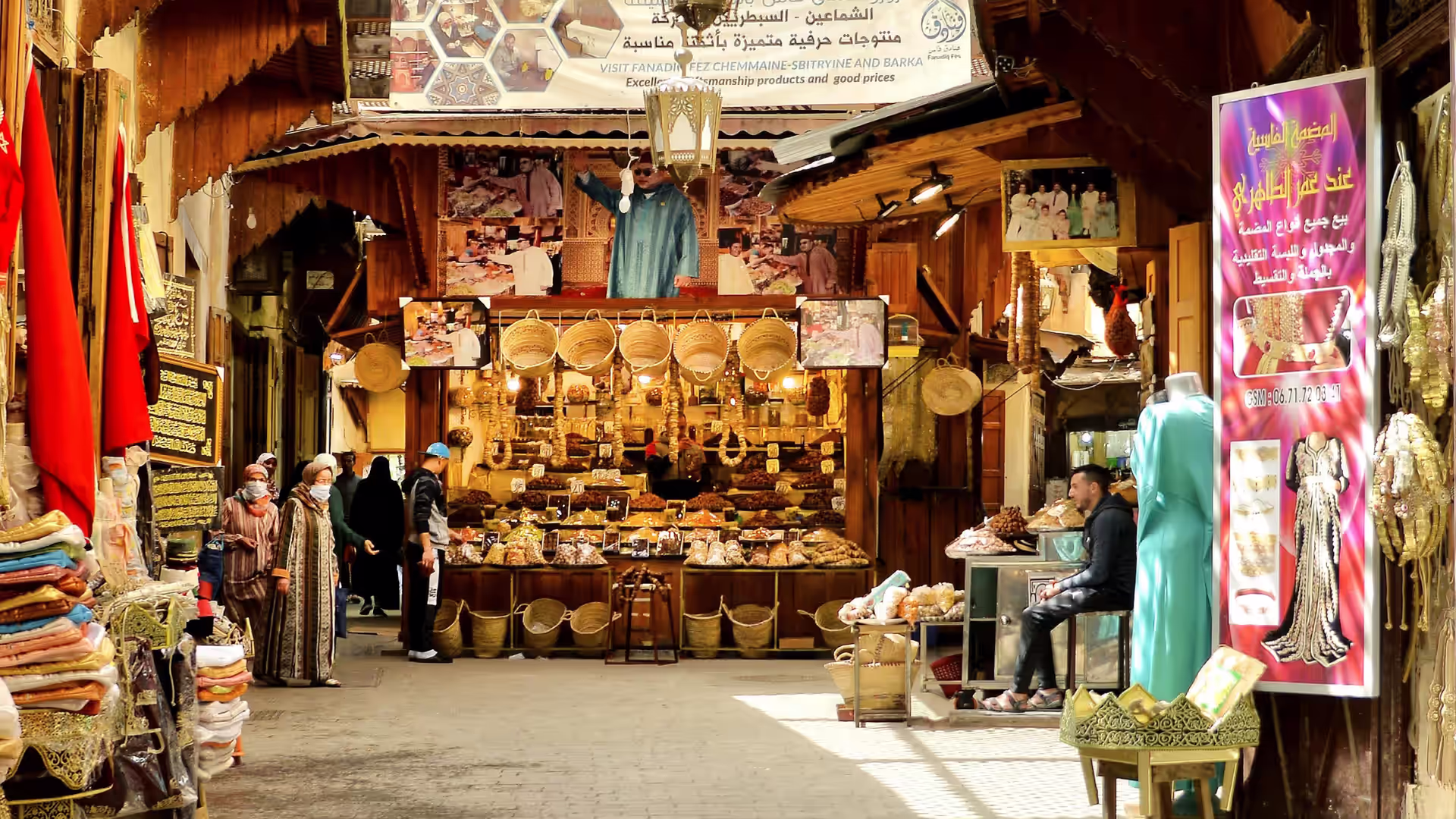 A traveller walking a medina street in Morocco